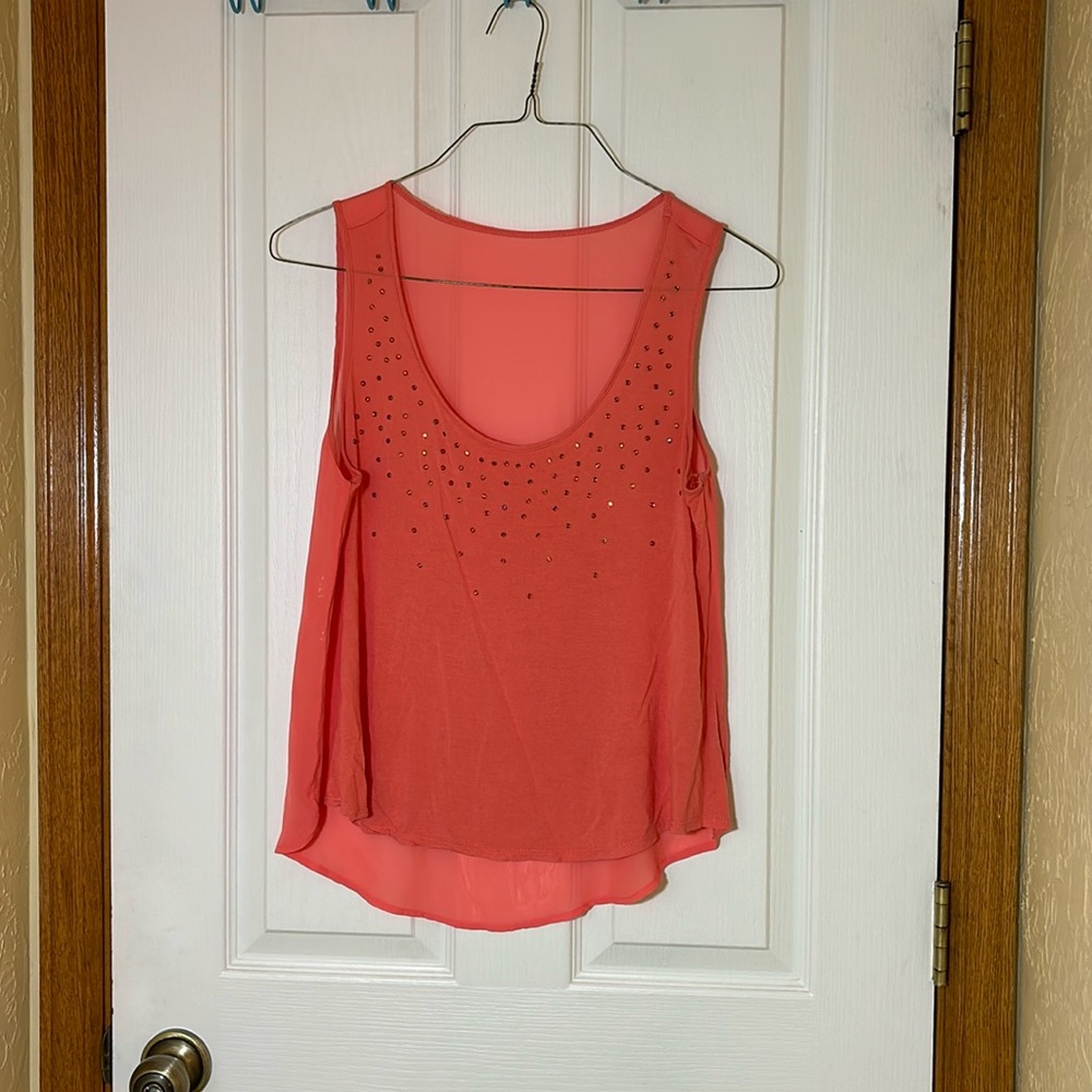 Peach tank top with peach rhinestones on the front, size M